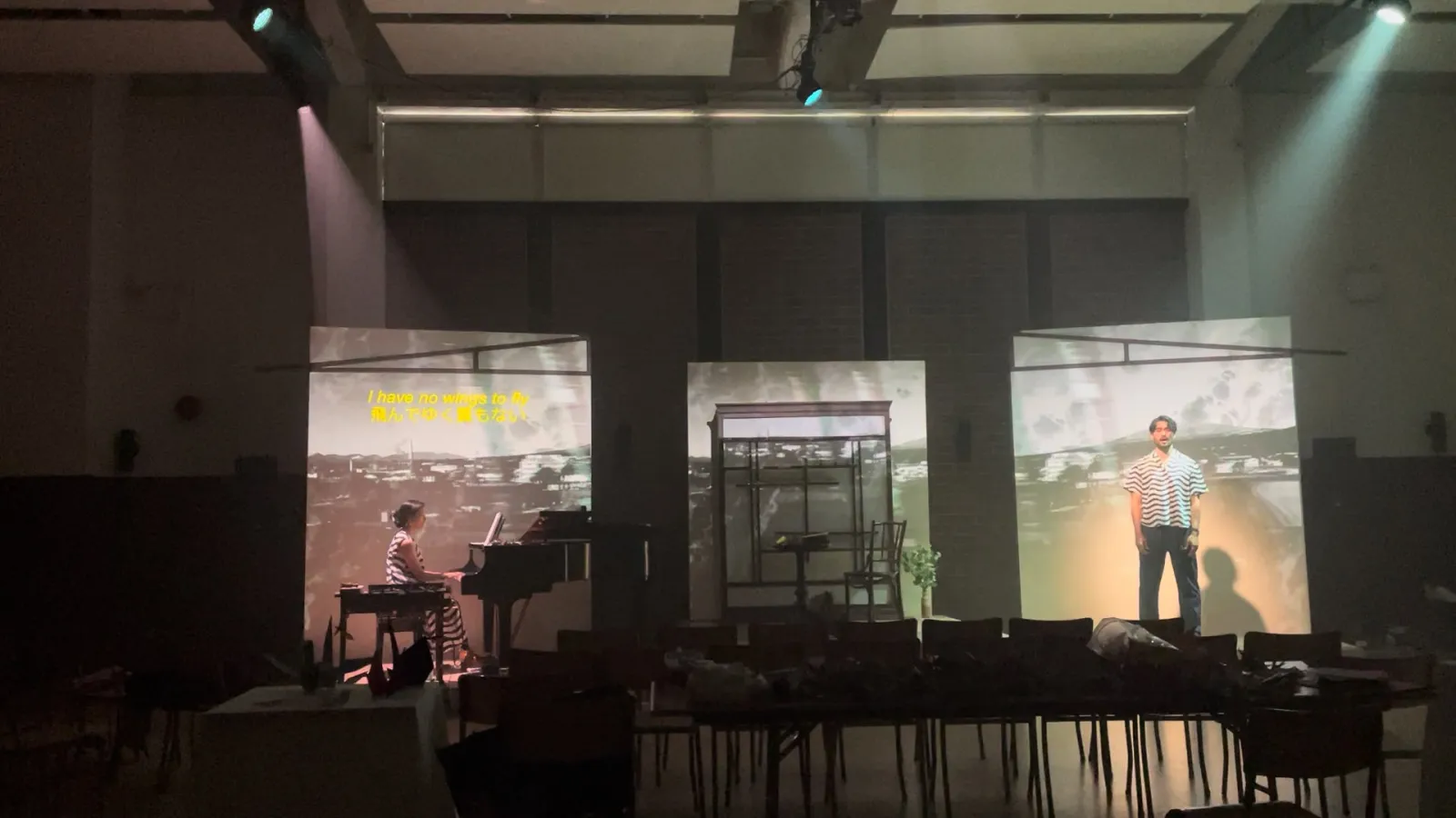 The HAFU Project with live piano, performer and projections across a multi-panel set