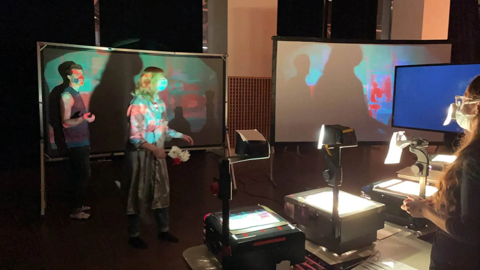 Shadow-puppetry rehearsal with overhead projectors in the studio